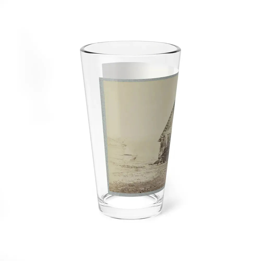 A Group Of Soldiers, And Two Young Men, One An African American, Stand Outside Of Log Cabin Quarters (U.S. Civil War) Pint Glass 16oz - Go Mug Yourself