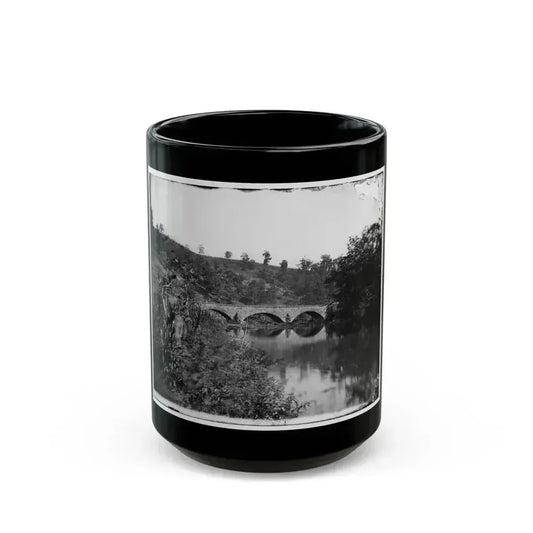Antietam, Maryland. Antietam Bridge, Looking Down Stream (U.S. Civil War) Black Coffee Mug 15oz - Go Mug Yourself