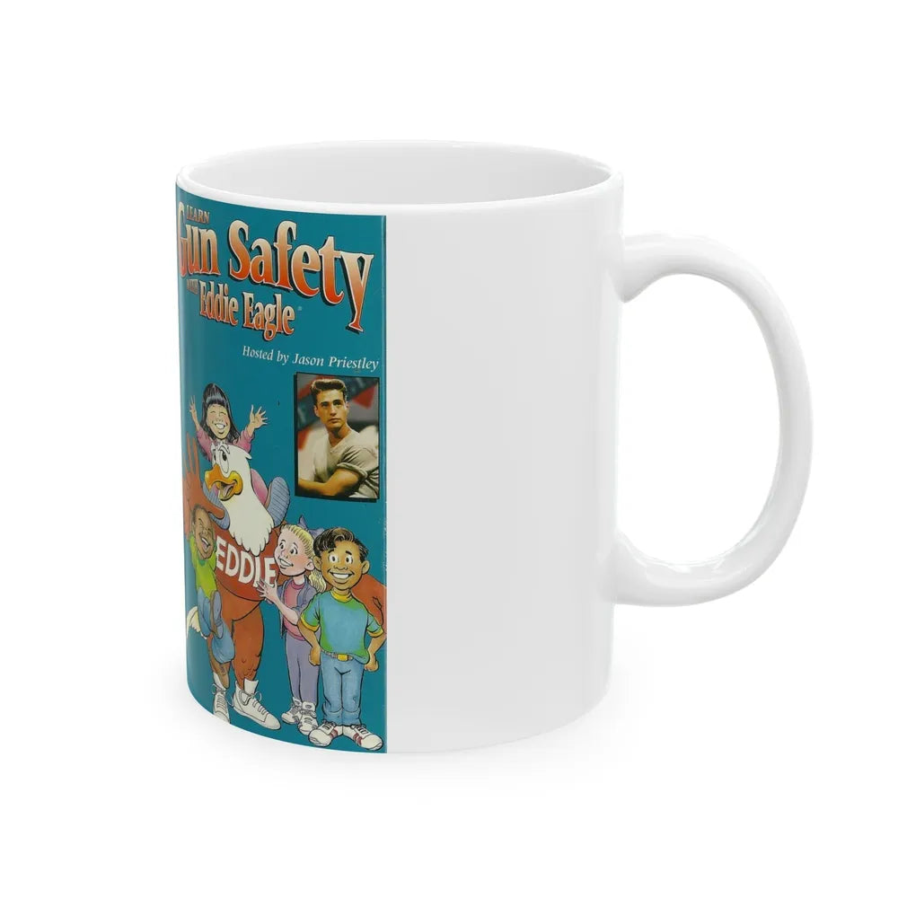 LEARN GUN SAFETY WITH EDDIE EAGLE HOSTED BY JASON PRIESTLEY (VHS COVER) - White Coffee Mug-Go Mug Yourself