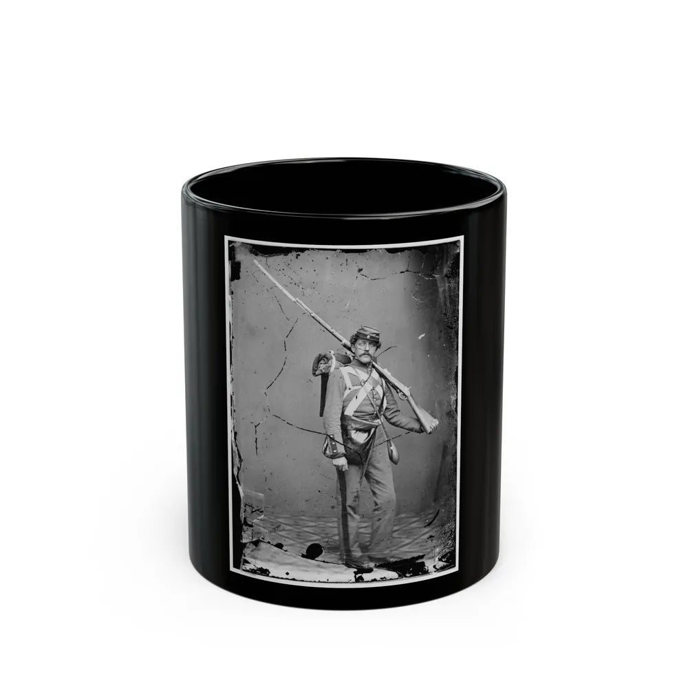 Unknown Location. Unidentified Union Volunteer With Shouldered Rifle And Bayonet In Photographer's Studio (U.S. Civil War) Black Coffee Mug-11oz-Go Mug Yourself