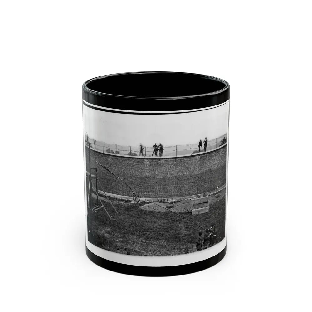 Washington, D.C. Coffins And Open Graves Ready For The Conspirators' Bodies At Right Of Scaffold (U.S. Civil War) Black Coffee Mug-11oz-Go Mug Yourself