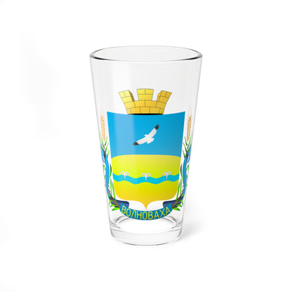 Coat of arms with a white soaring bird on sky blue over yellow ground, framed by wheat ears and a blue ribbon.