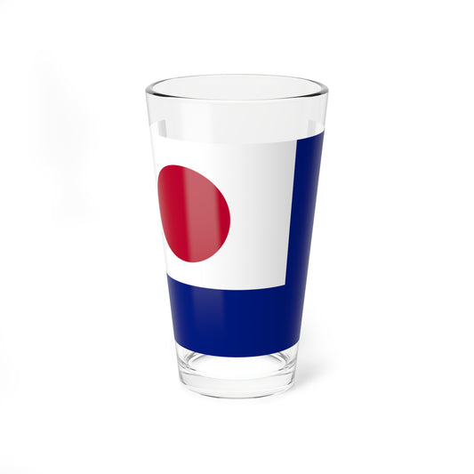 A white square with a solid red circle centered in it, set against a deep blue background.