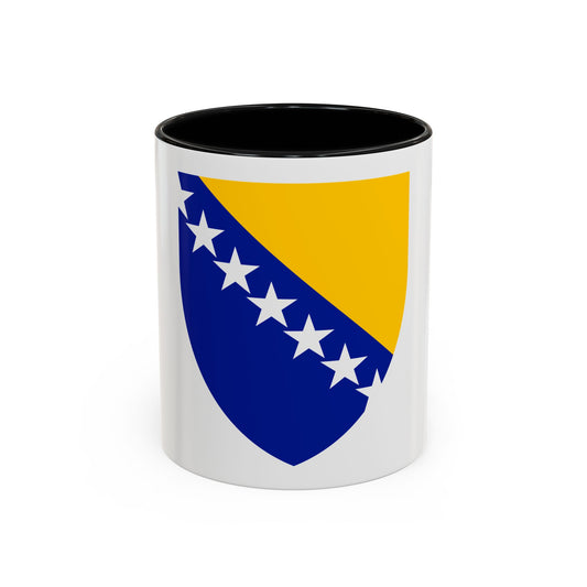Blue and gold shield split diagonally, with six white five-pointed stars along the dividing line.
