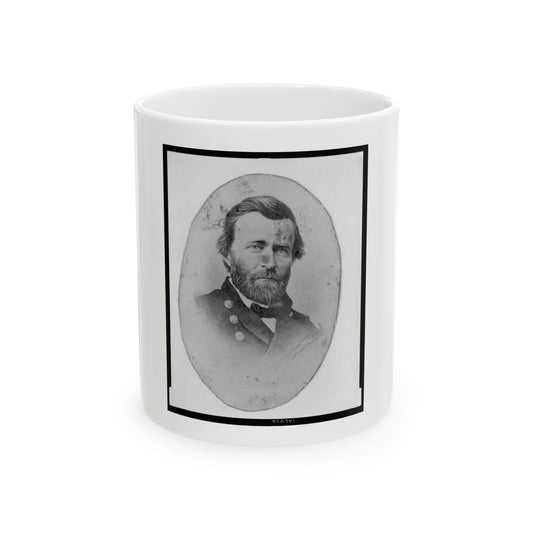 Black and white oval portrait of a bearded man in a dark military-style jacket with brass buttons and bow tie.