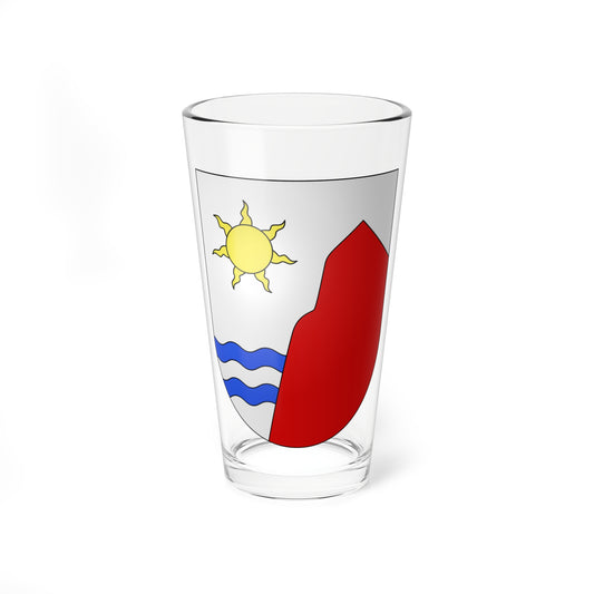Heraldic shield divided diagonally, with a yellow sun on silver, a red mountain and blue wavy bars at the base.