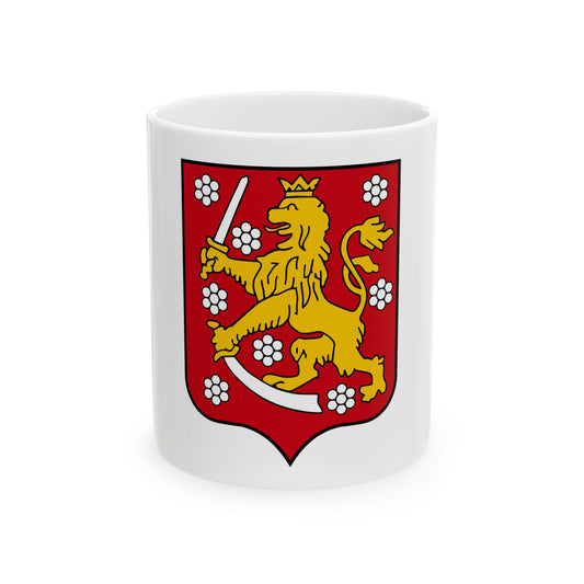 Red heater shield with a gold crowned lion gripping a sword and a sabre, surrounded by white flower clusters.