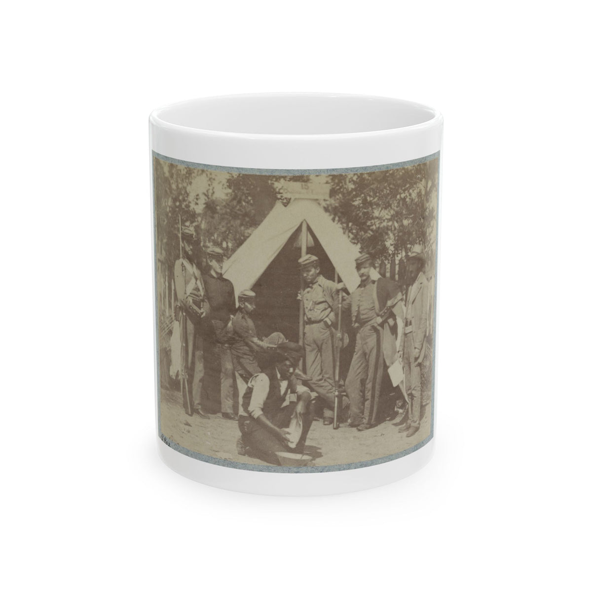 Sepia print showing several soldiers with rifles beside a peaked canvas tent, with one figure kneeling in front.