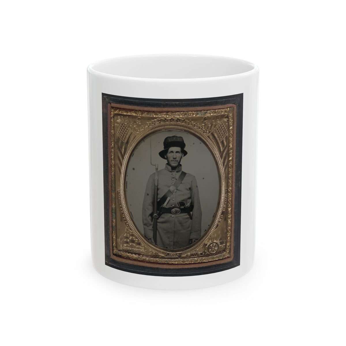 Monochrome tintype of a Civil War soldier with a rifle and bayonet, in a gilt frame embossed with flags and stars.
