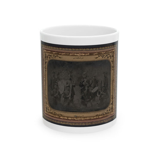 Sepia tintype of about ten brass band musicians with cornets, horns and a drum, set in an ornate gilt frame.