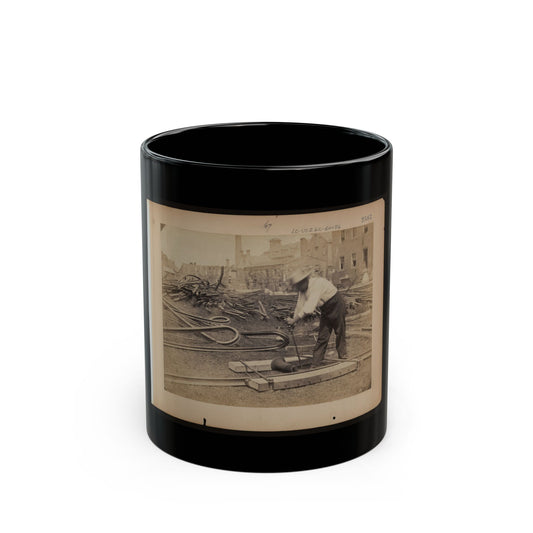Railroad Construction Worker Straightening Track; Pile Of Twisted Rails In Background. 1862-63 (U.S. Civil War) Black Coffee Mug