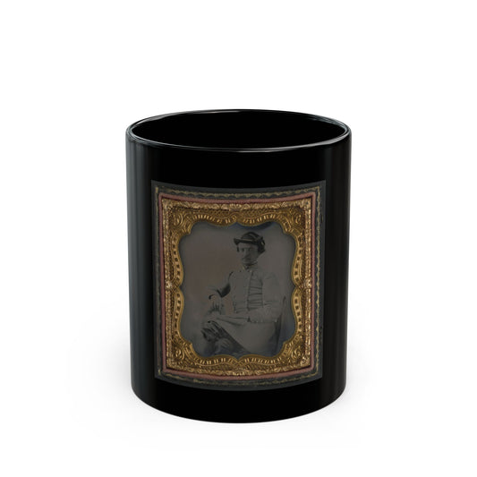 Tintype portrait of a seated man in a light grey military-style jacket and slouch hat, in an embossed gilt case.