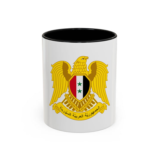 Gold eagle with spread wings above a red, white and black shield with two green stars, wheat and an Arabic banner.
