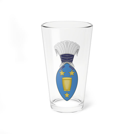 Blue heraldic shield with a gold drum and three gold stars, topped by a white feathered plume and navy beaded band.