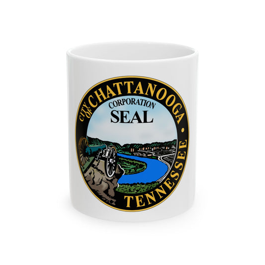 Circular seal of Chattanooga, Tennessee, showing a cannon on a rock ledge above a river bend and the city skyline.