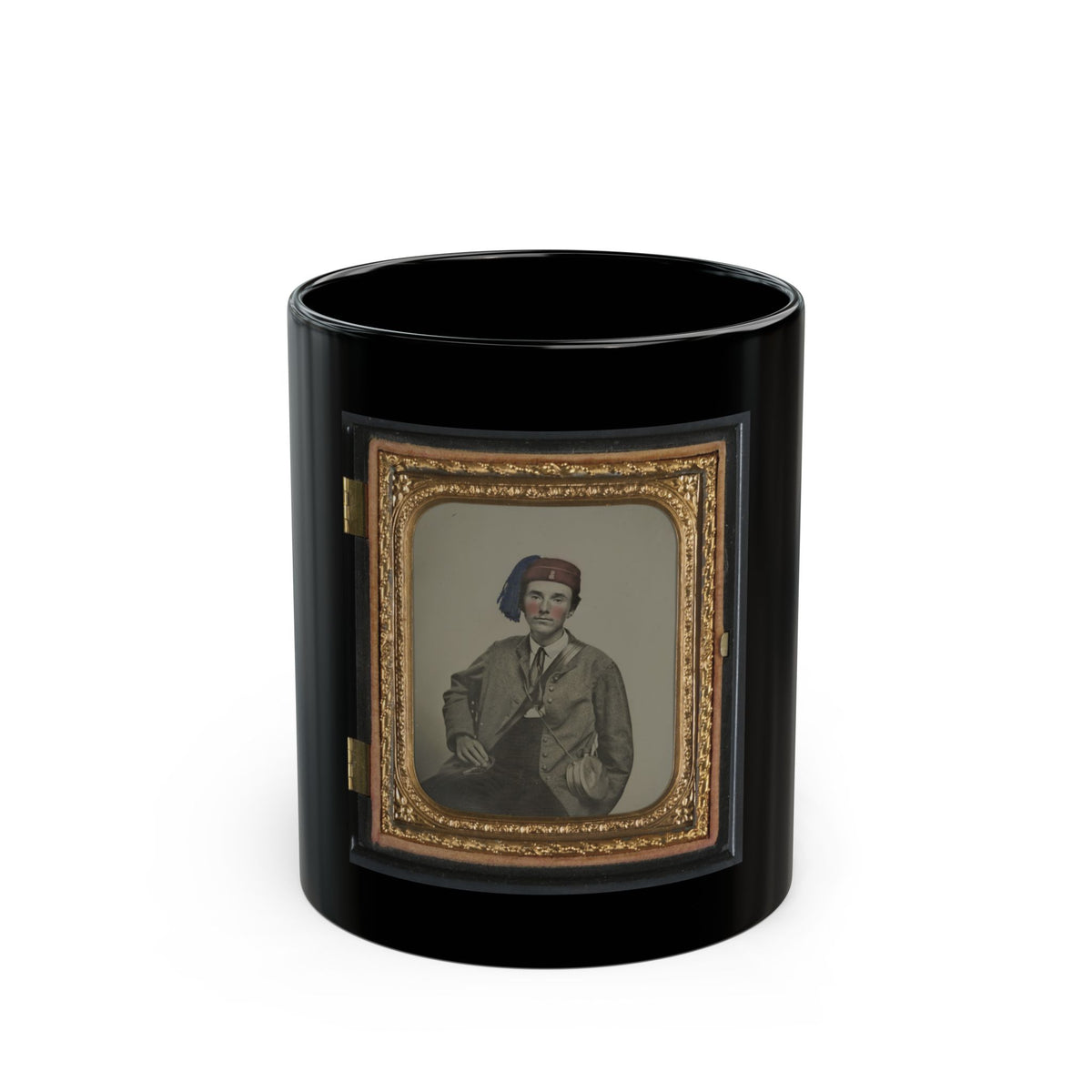Hand-tinted tintype of a seated young soldier in a grey jacket and red fez with a blue tassel, in a gilt case.