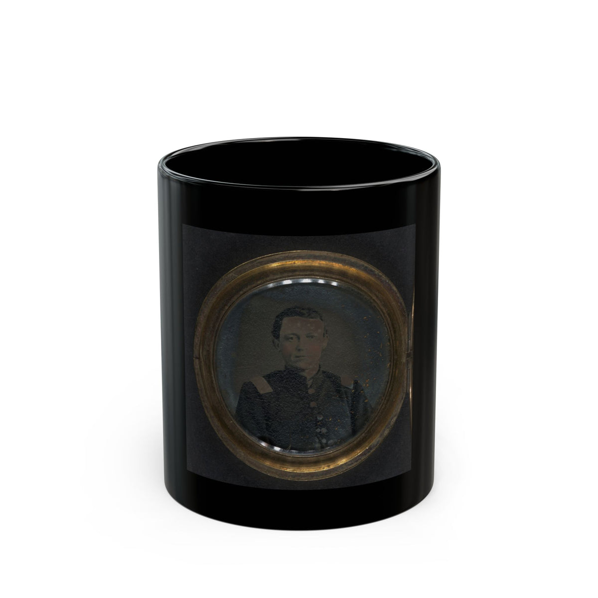 Small antique tintype of a young man in a dark military jacket with shoulder straps, in a round brass locket case.