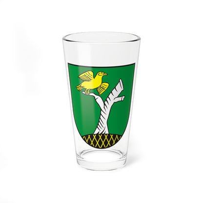 Green heraldic shield with a yellow songbird perched on a white bare branch above a black lattice mound.