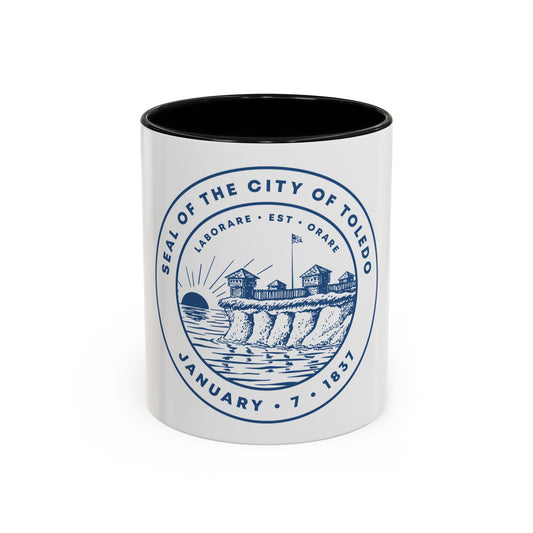 Blue monochrome circular seal of Toledo, Ohio, showing a wooden stockade fort on a bluff above water at sunrise.