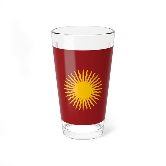 Golden sun with alternating straight and wavy rays centered on a solid burgundy background.