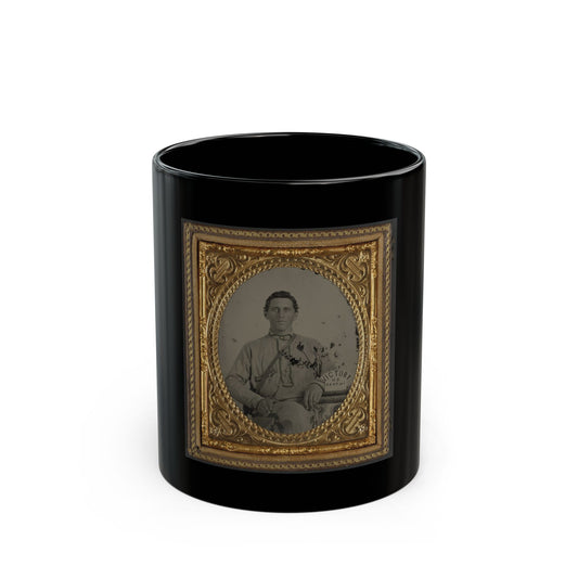 Antique tintype of a seated man in a light jacket, in an ornate gilt oval case with a paper label reading Victory or Death.