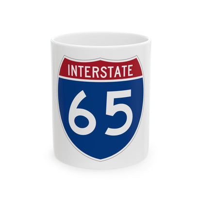 Blue Interstate 65 shield with a red band reading INTERSTATE and the number 65 in large white digits.
