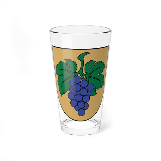 Blue-purple grapes hang beneath green vine leaves on a tan heraldic shield, in flat vector style.