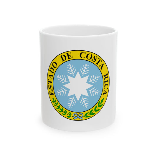 Circular yellow seal with lettering around a white star on light blue, framed by a green laurel branch.
