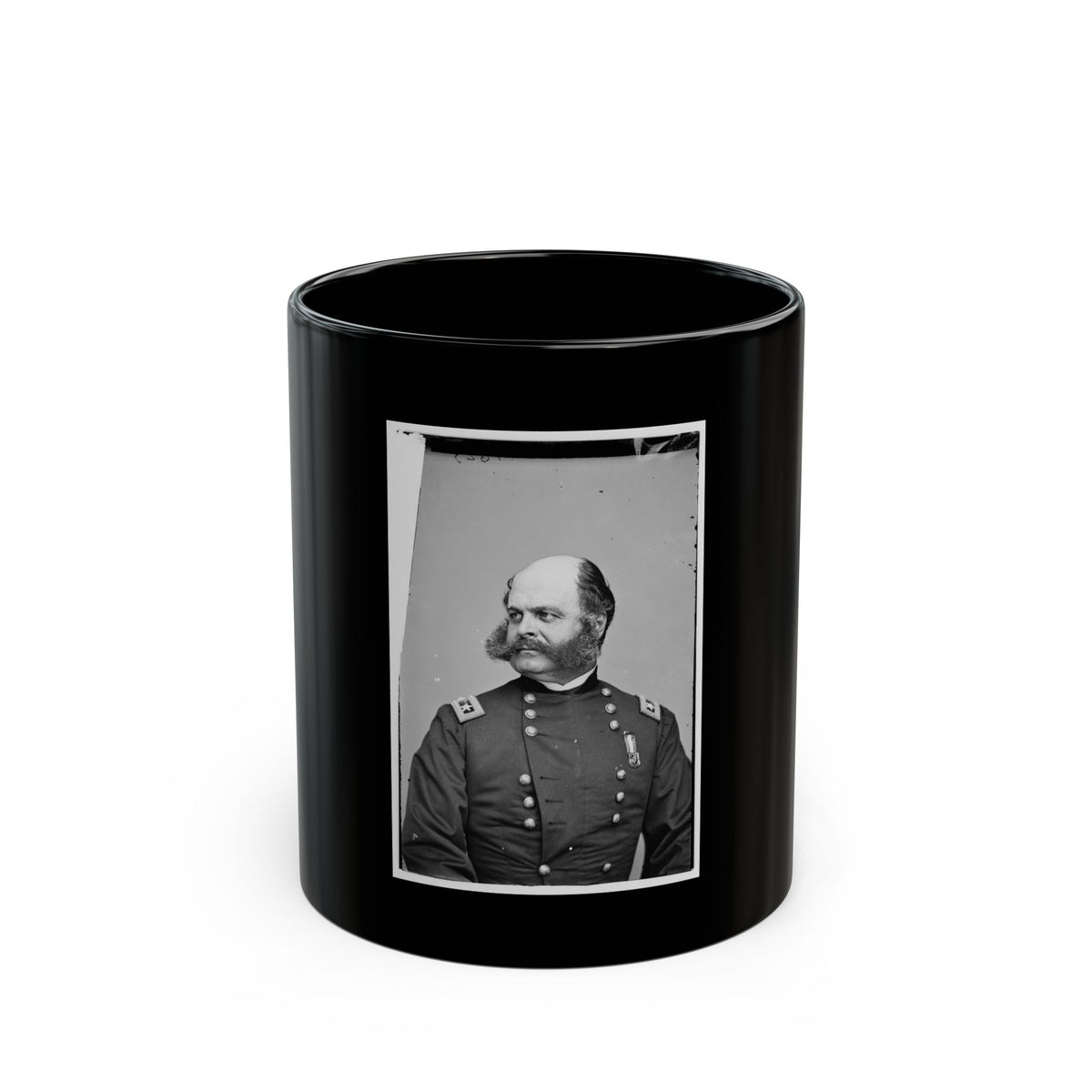 Black and white 1860s studio portrait of a mustached officer in a dark coat with star shoulder straps.