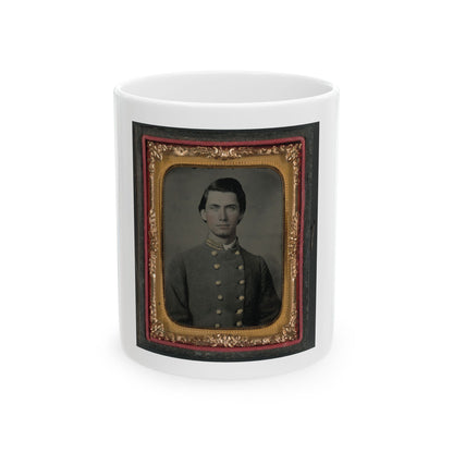 Hand-tinted tintype portrait of a young man in a grey military-style jacket with gold collar piping, in a gilt case.