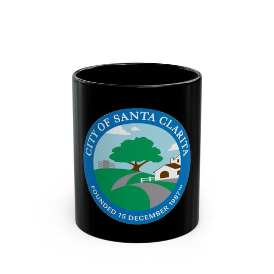 Round blue-bordered civic badge for Santa Clarita, California, with an oak tree, a winding road and a white house.