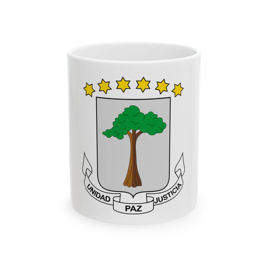 Grey heraldic shield with a green tree and six yellow stars above, under a banner reading UNIDAD, PAZ, JUSTICIA.
