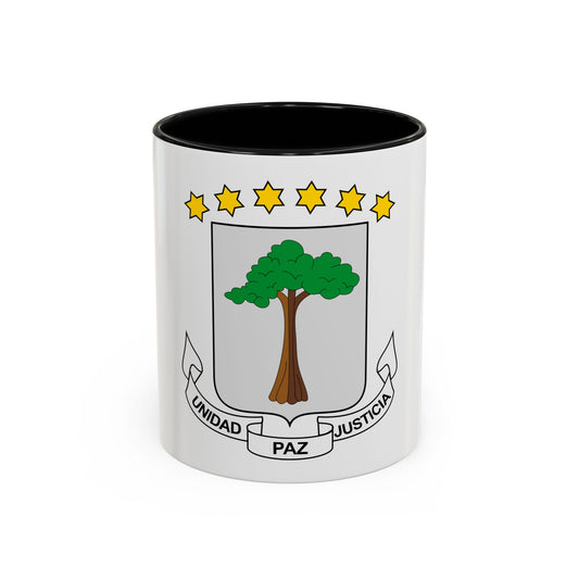 Grey heraldic shield with a green tree and six yellow stars above, under a banner reading UNIDAD, PAZ, JUSTICIA.