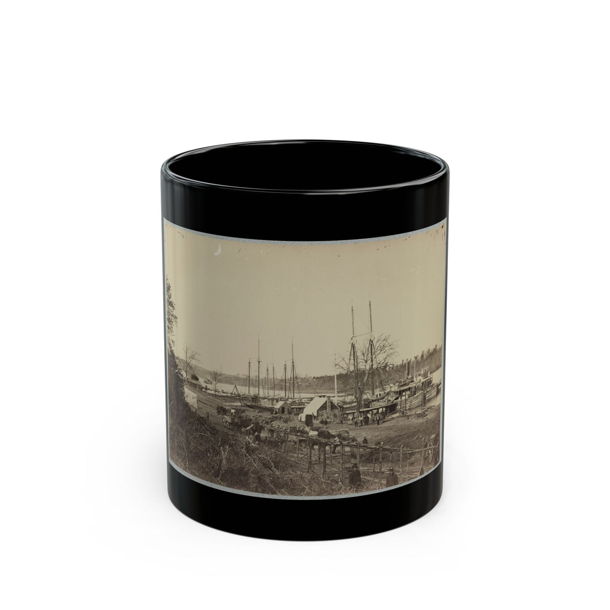 Sepia view of masted sailing ships and a paddle steamboat moored at a riverside landing with wagons on shore.