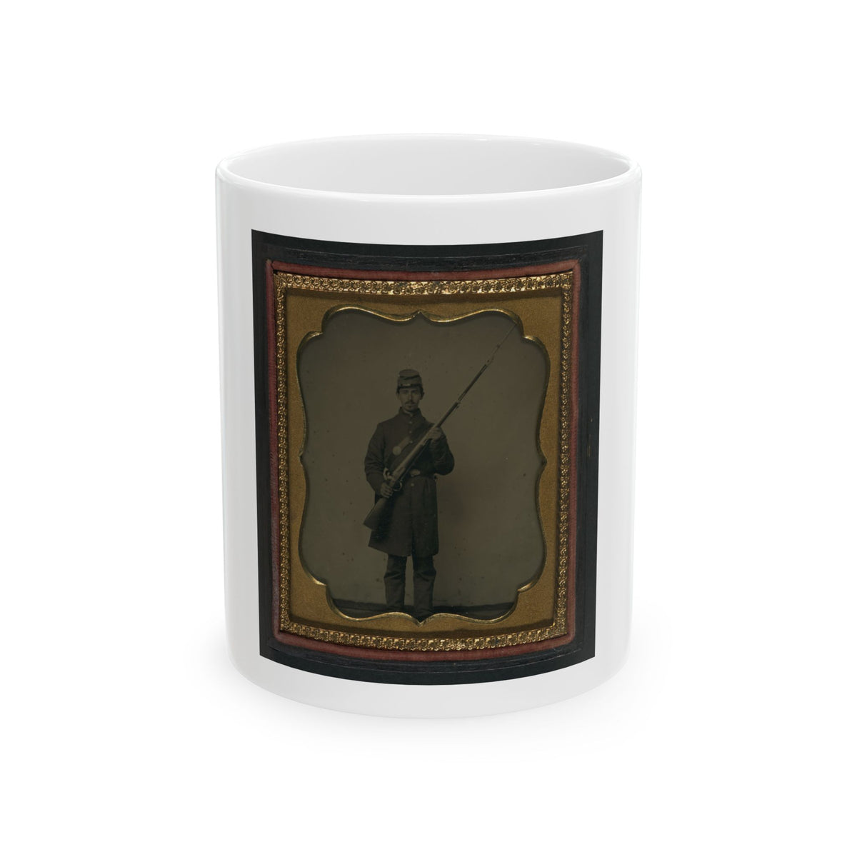 Antique tintype of a Civil War infantryman standing with a musket and bayonet, in a scalloped gilt case.