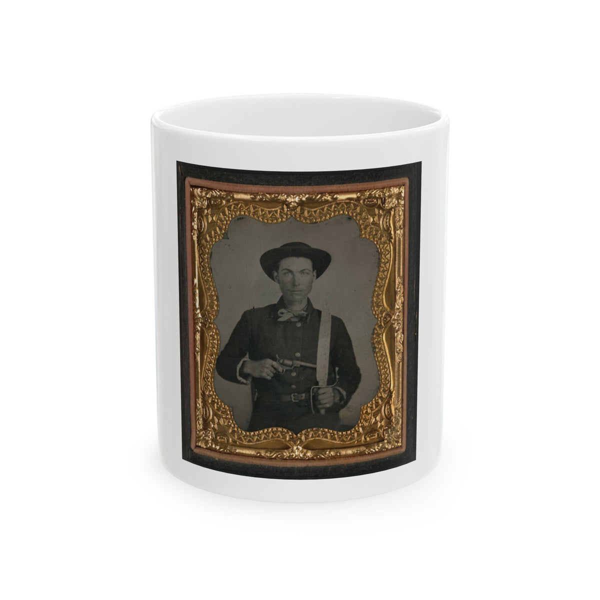 Sepia tintype of a man in a wide-brimmed hat holding a revolver and a sword, set in an ornate gilt frame.