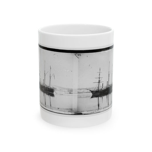 Black and white stereo view of two steamships at anchor on still water, with their reflections below.