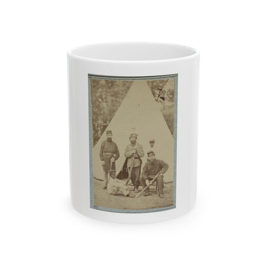 Sepia print showing five soldiers posed before a white conical tent, several holding rifles.
