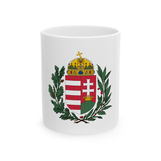 National coat of arms with a jeweled gold crown, a red and white striped shield, a double cross and oak branches.