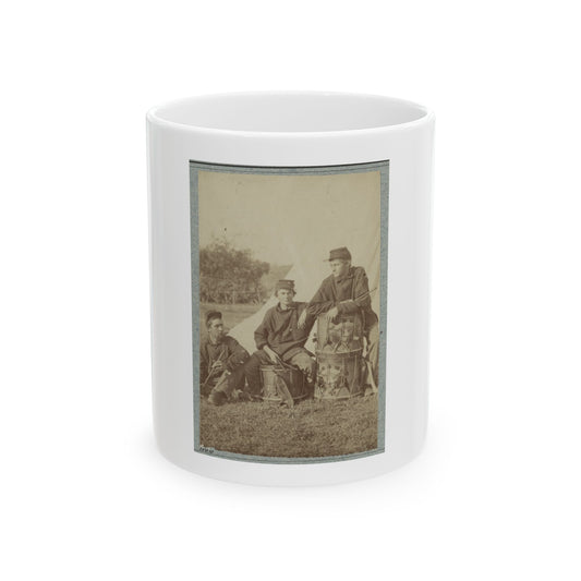Sepia print showing three soldiers posed with snare drums in front of a white canvas tent.