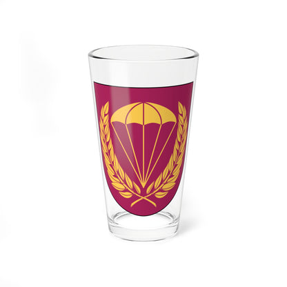 Gold open parachute above a gold laurel wreath with crossed stems on a maroon heraldic shield.