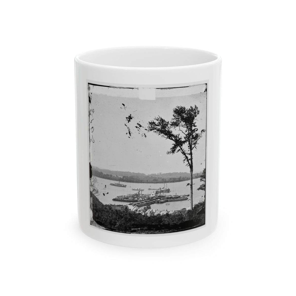 Black and white print of steamboats moored on a wide river beside white tents on a wooded bank.