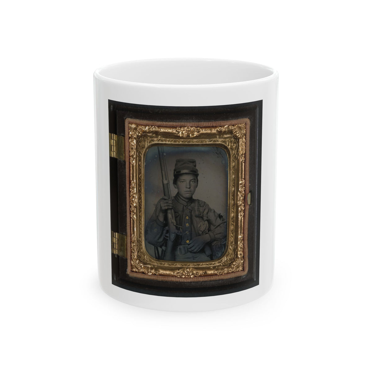 Hand-tinted 1860s tintype of a young soldier in a kepi holding a rifle upright, framed in an ornate gilt case.