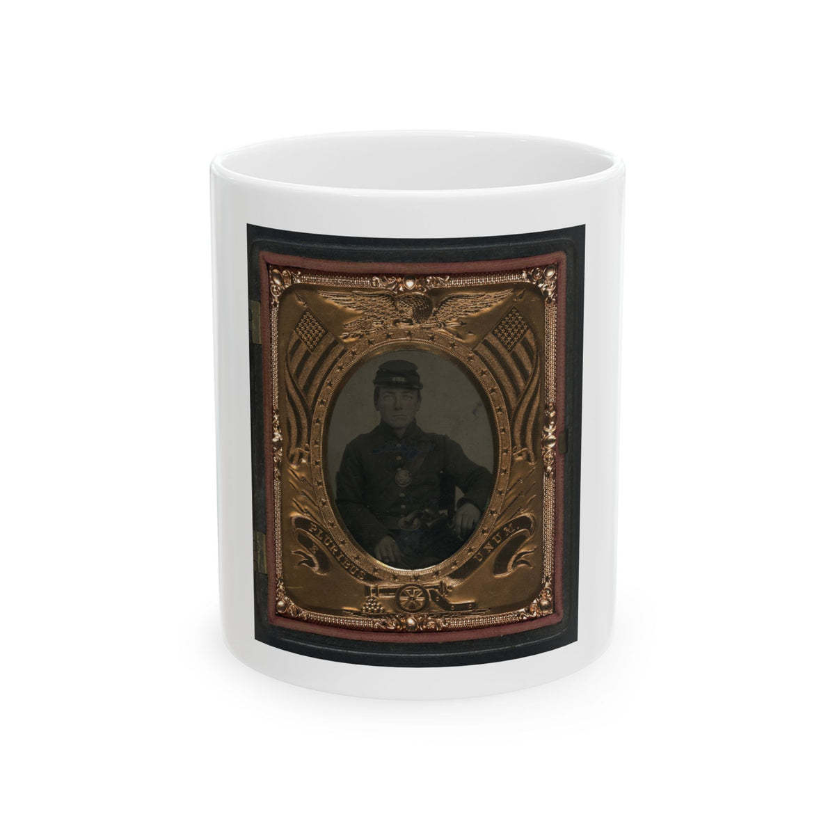 Antique tintype of a seated Union soldier in an ornate gilt frame decorated with an eagle, flags and a cannon.