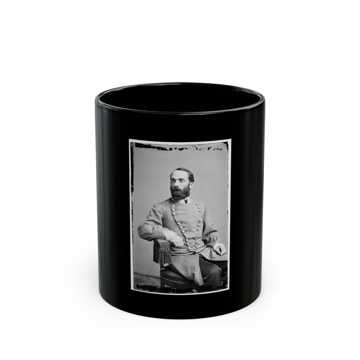 Black and white 19th-century portrait of a bearded man in a double-breasted coat, seated in a tasselled chair.