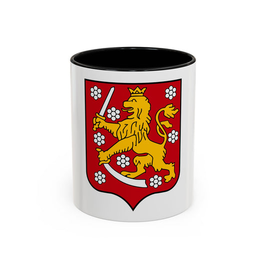 Red heater shield with a gold crowned lion gripping a sword and a sabre, surrounded by white flower clusters.