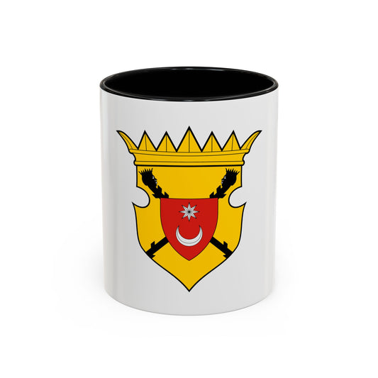 Gold heraldic shield with a crown on top, a red inner shield bearing a white star and crescent, and black heads.