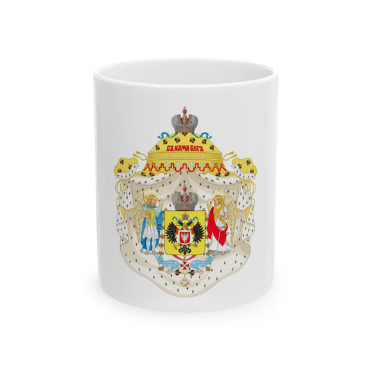 Imperial heraldic achievement with a black double-headed eagle on gold, two winged angels and a crown over cream mantling.