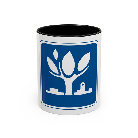 White tree and buildings pictogram on a dark blue rounded square with a white border, and no lettering.
