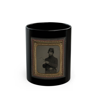 Antique tintype of a bearded soldier in a kepi holding a hand-drawn map labelled Virginia, in an ornate gold frame.